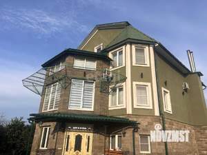 Дом 555м², 4-этажный, участок 15 сот.  