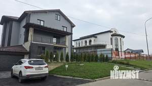 Коттедж 470м², 4-этажный, участок 10 сот.  